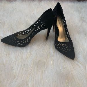 Black heels with unique designs